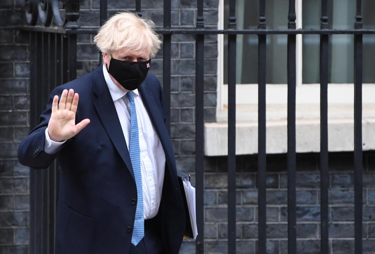 <p>The Prime Minster leaves Downing Street to address Parliament on Wednesday</p> (EPA)