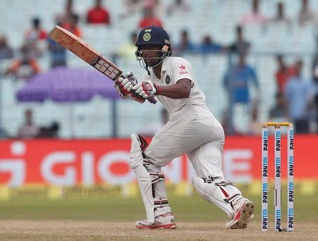 Cricket - India v New Zealand - Second Test cricket match - Eden Gardens, Kolkata - 01/10/2016. India's Wriddhiman Saha plays a shot. REUTERS/Rupak De Chowdhuri