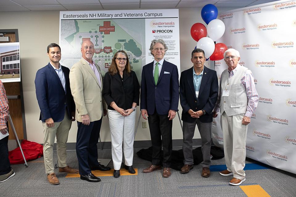 Easterseals NH held a press conference to showcase design plans, created by PROCON, for its new military and veterans campus to be developed in Franklin, NH. Pictured from left to right are speakers from the event, John Stebbins, Managing Director, PROCON; Andy MacWilliam, Chair of the Board of Easterseals NH; Maureen Beauregard, President & CEO, Easterseals NH; Commissioner Taylor Caswell, NH Department of Business and Economic Affairs; Commissioner David Mikolaities, NH Department of Military and Veterans Affairs; and Michael Salter, Veterans Count Volunteer, Easterseals NH. Missing from photo, Governor Chris Sununu.