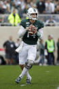 Michigan State quarterback Brian Lewerke looks to throw against Indiana during the first quarter of an NCAA college football game, Saturday, Sept. 28, 2019, in East Lansing, Mich. (AP Photo/Al Goldis)