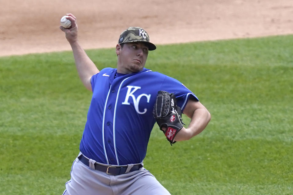 Kansas City Royals starting pitcher Brad Keller delivers in the first inning of the first game of a baseball doubleheader Friday, May 14, 2021, in Chicago. (AP Photo/Charles Rex Arbogast)