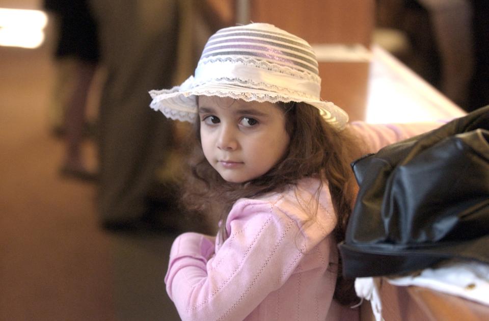 Josie Mazzola, 4, of Newark, looks back at her mother while Bishop Michael Saltarelli, of Wilmington, leads the Easter service at St. Margaret of Scotland RC Church in Newark Sunday, March 23, 2008. Saltarelli established the new parish to provide for the growing denomination.
Special to the News Journal/ Emily Varisco