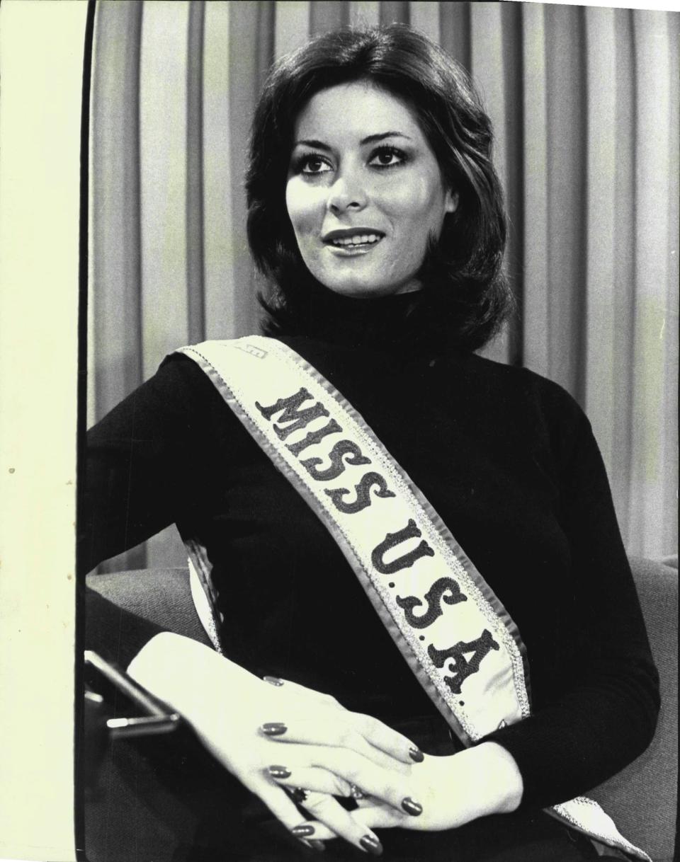 Miss USA 1975 Summer Bartholomew poses in her sash.