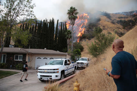 The La Tuna Canyon fire over Burbank, California, September 2, 2017. REUTERS/Kyle Grillot