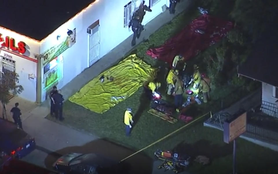 In this aerial image made from video shows the scene where emergency workers have cordoned off an area to deal with victims of a shooting, early Wednesday, Oct. 30, 2019, in Long Beach, Ca. (KABC via AP)