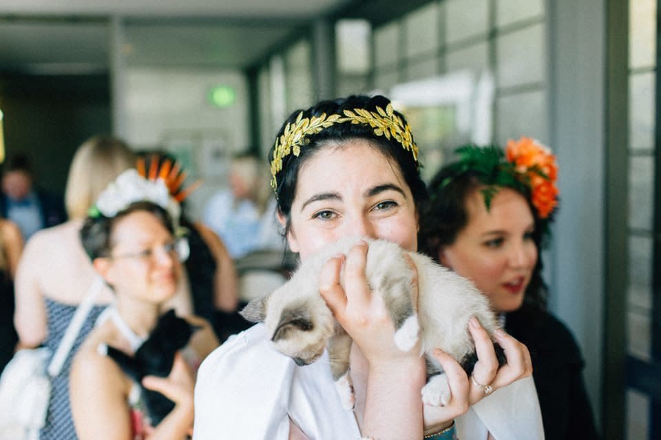 Colleen (above) and Iz provided a "kitten hour" instead of a cocktail hour for their guests. (Photo: <a href="https://www.fuckyeahweddings.com/" target="_blank">Kendall Lauren Shea / fuckyeahweddings.com</a>)