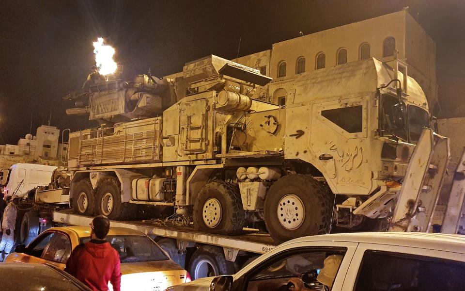 Forces loyal to Libya's UN-recognised Government of National Accord (GNA) parade a Pantsir air defense system truck in the capital Tripoli - MAHMUD TURKIA/AFP