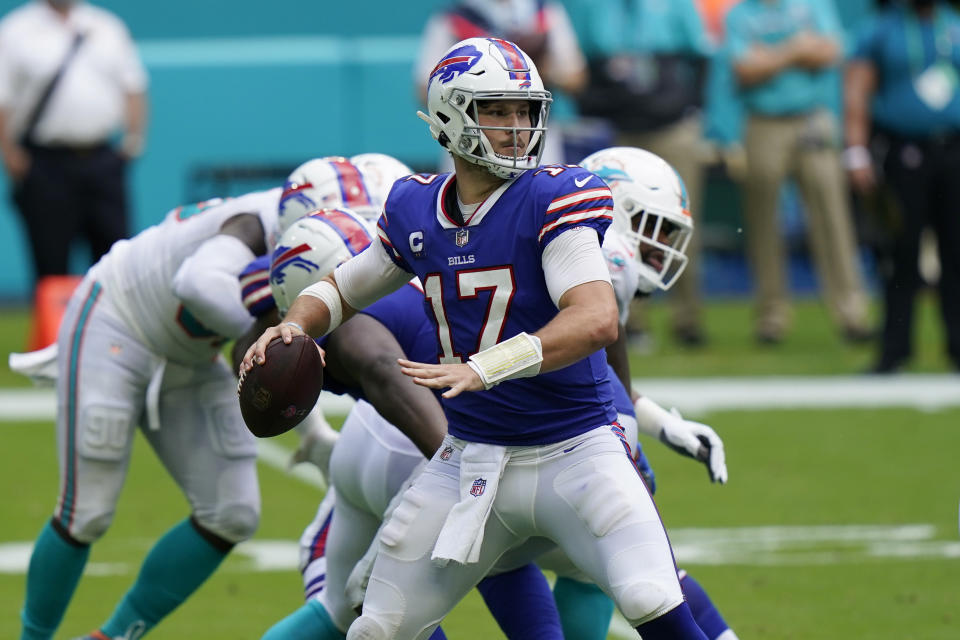 Buffalo Bills quarterback Josh Allen (17) looks to pass, during the second half of an NFL football game against the Miami Dolphins, Sunday, Sept. 20, 2020, in Miami Gardens, Fla. (AP Photo/Lynne Sladky)