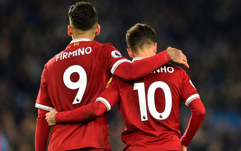 Firmino and Coutinho - GLYN KIRK/AFP/Getty Images