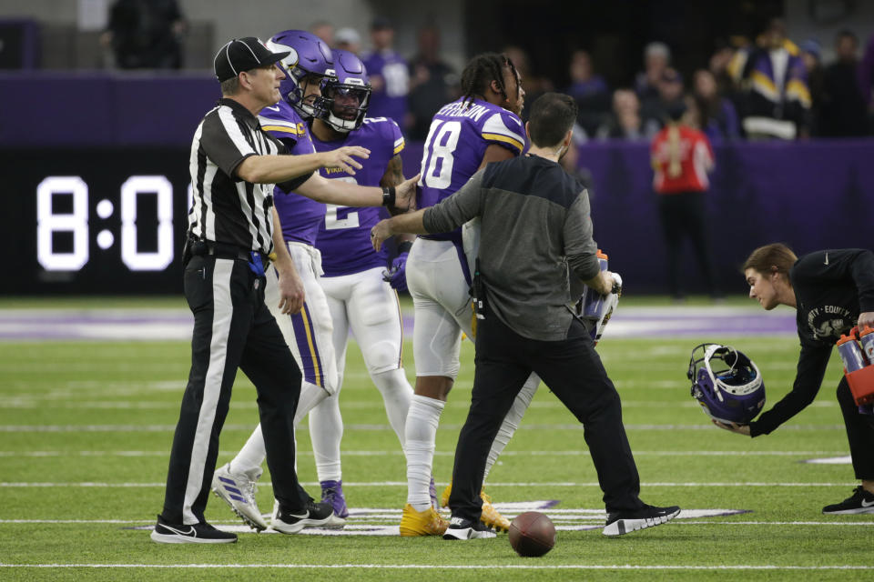 Minnesota Vikings wide receiver Justin Jefferson (18) is helped off the field after getting injured during the second half of an NFL football game against the Indianapolis Colts, Saturday, Dec. 17, 2022, in Minneapolis. (AP Photo/Andy Clayton-King)