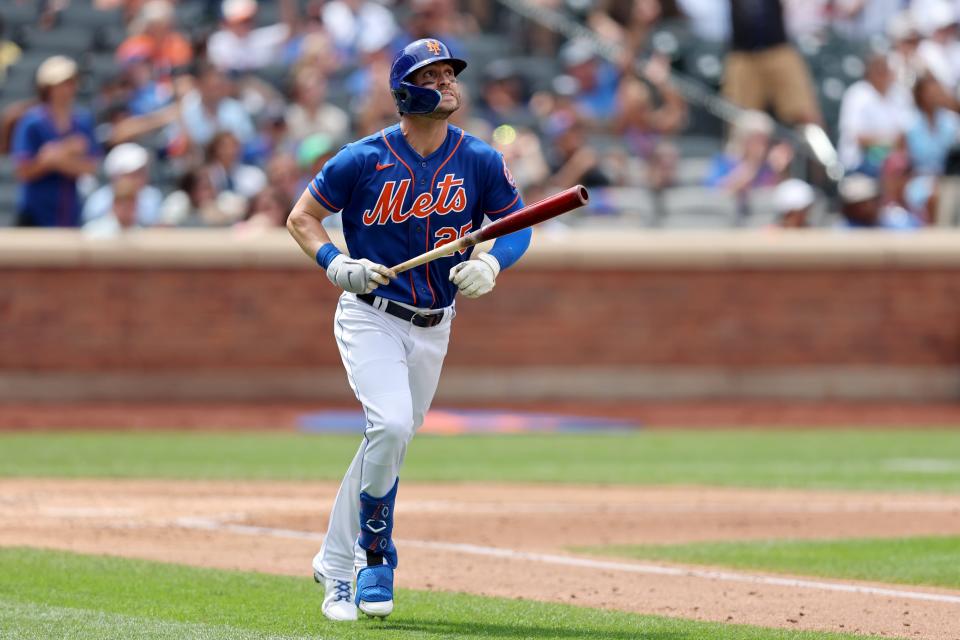 Tyler Nquin hit .229 with 11 home runs and 46 runs batted in over 105 games with the Cincinnati Reds and New York Mets in 2022.