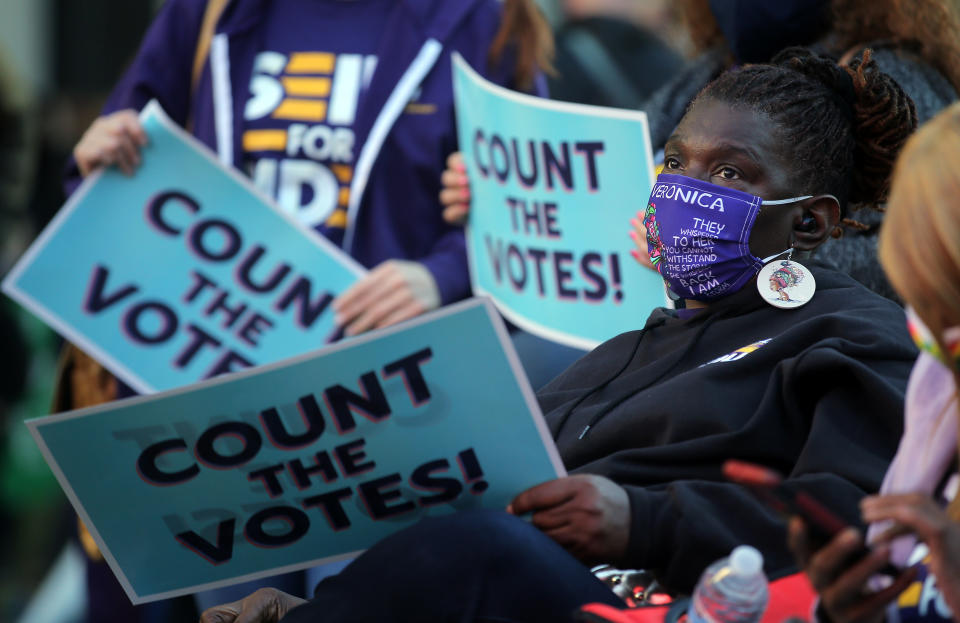 WASHINGTON D.C., USA - NOVEMBER 4, 2020: People with "Count the Votes" signs are seen during a protest in support of the vote counting in the US presidential election, at McPherson Square after the 2020 US Election Day. Trump's election campaign team has filed a lawsuit trying to stop the counting of all outstanding ballots in Michigan claiming that the campaign team have not been provided with meaningful access to numerous counting locations to observe the opening of ballots and the vote counting. On November 3, 2020, Americans voted to elected a president and vice president, 35 Senators, all 435 members of the House of Representatives, 13 governors of 11 states and two US territories, as well as state and local government officials. Running for president are incumbent Republican President Trump and Democratic Party nominee Biden. Yegor Aleyev/TASS (Photo by Yegor Aleyev\TASS via Getty Images)