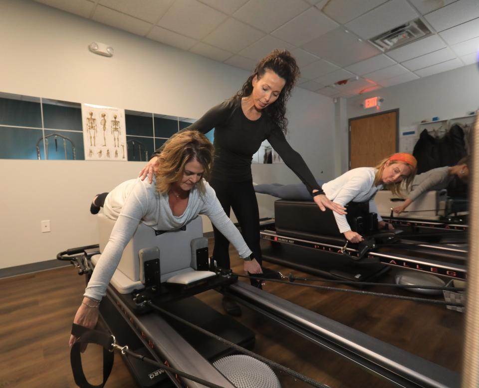 Brenda Basteiro guides Jackie McKnight during a reformer Pilates session at RB Pilates studio in Cornwall on January 23, 2024. Basteiro is the process of opening a Club Pilates in the Town of Poughkeepsie.