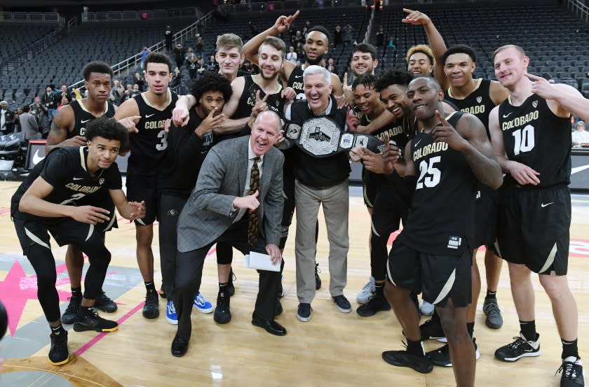 Colorado Buffaloes with the championship belt after their 71-67 victory over the Clemson Tigers Nov. 26, 2019 in Las Vegas