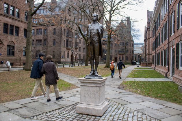 A statue of Nathan Hale, a Yale University class of 1773 graduate, with his hands and ankles bound with rope and the inscription 