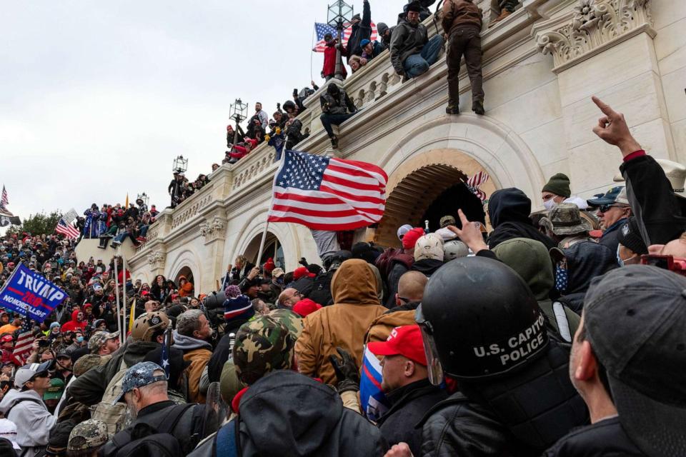 PHOTO: FILE - Demonstrators attempt to enter the U.S. Capitol building during a protest in Washington, D.C., Jan. 6, 2021. (Eric Lee/Bloomberg via Getty Images, FILE)