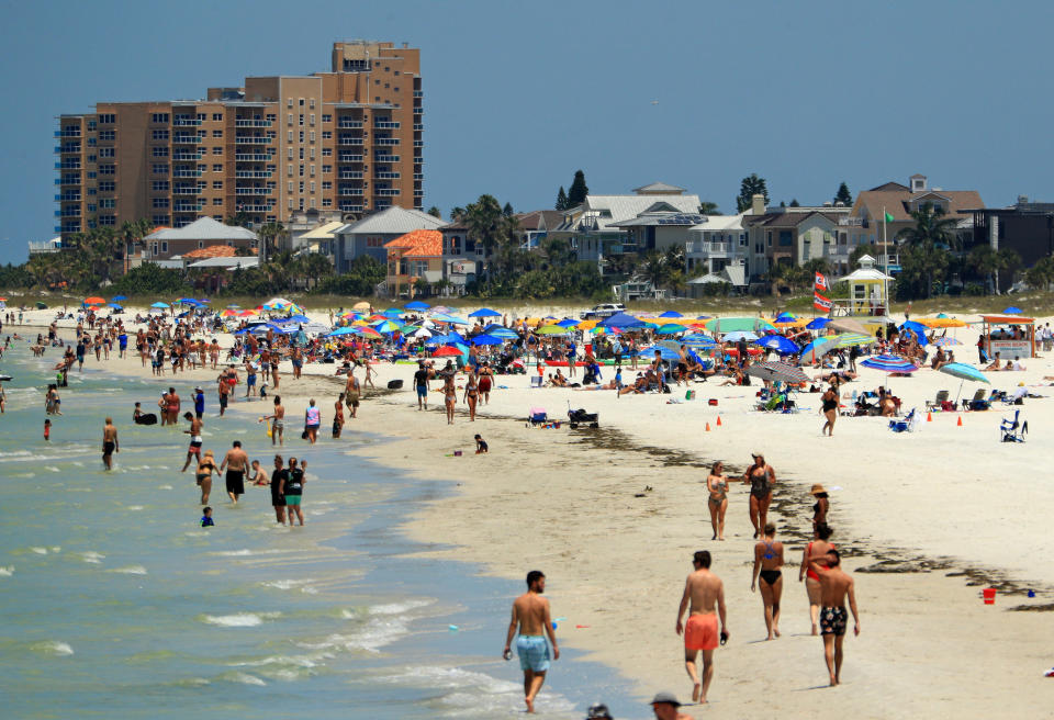 Visitors at Clearwater Beach after Gov. Ron DeSantis opened the beaches on May 4, 2020 in Clearwater, Fla. (Mike Ehrmann / Getty Images)