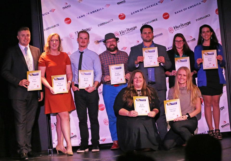 The 2022 10 To Watch Seacoast young professionals contest winners were named at the awards ceremony and reception presented by Catapult Seacoast and Seacoast Media Group on Tuesday, Nov. 1 at 3S Artspace in Portsmouth. From left are Leif Becker, Kat Howland, Kevin Dwyer, Wayne Moulton, Jayde Cherico, kneeling left, Matthew Paul, Ellen Roy, Torrey Lee Brooks, kneeling right,  and Jaime Yates.