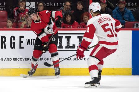 Nov 15, 2018; Ottawa, Ontario, CAN; Ottawa Senators right wing Drake Batherson (79) controls the puck against Detroit Red Wings center Frans Nielsen (51) in the first period at Canadian Tire Centre. Marc DesRosiers-USA TODAY Sports