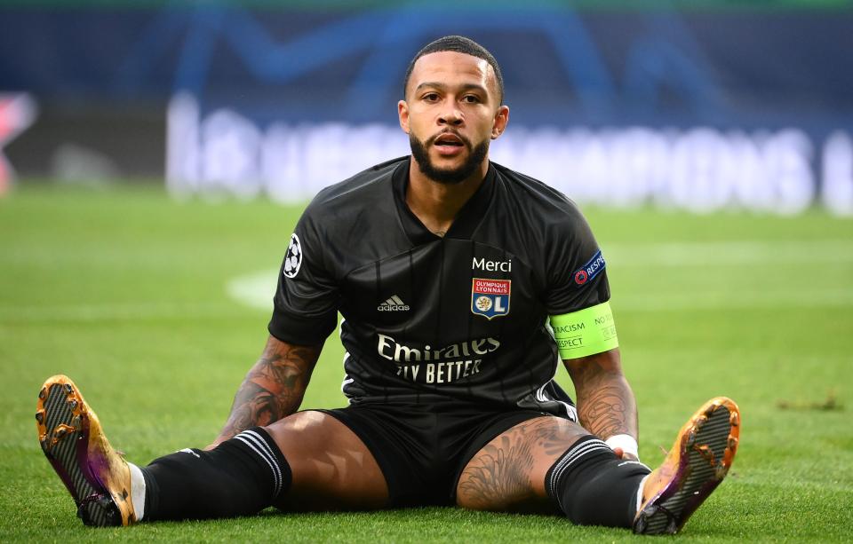 Lyon's Dutch forward Memphis Depay reacts during the UEFA Champions League semi-final football match between Lyon and Bayern Munich at the Jose Alvalade stadium in Lisbon on August 19, 2020. (Photo by FRANCK FIFE / POOL / AFP) (Photo by FRANCK FIFE/POOL/AFP via Getty Images)