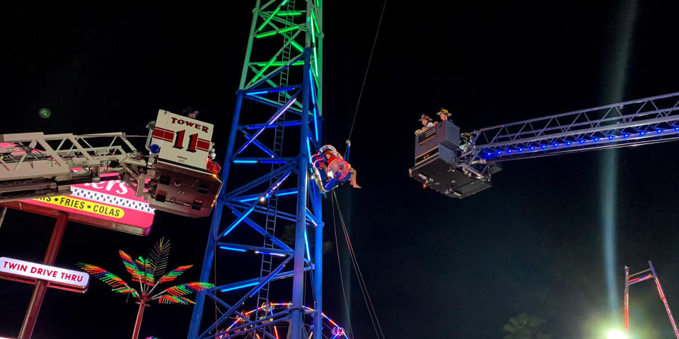 Image: Two teens being rescued from 'Slingshot' ride in Kissimmee, Fla. (Osceola County Fire Rescue and EMS)