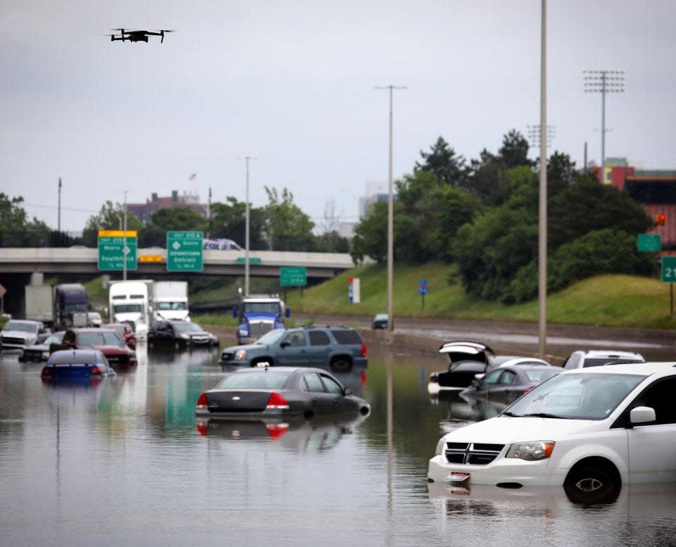 Metro Detroit drivers had to abandon their cars after freeways were hit by heavy rains and floods on Sat., June 26, 2021.