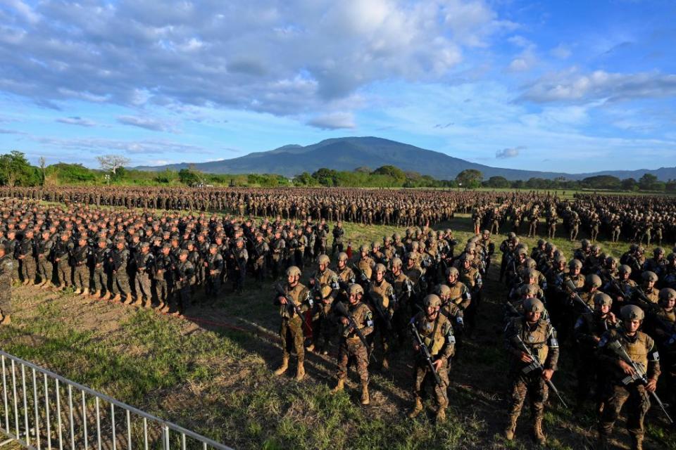 Soldiers listen as El Salvador's President Nayib Bukele addresses them near a military barracks on the outskirts of San Juan Opico,west of San Salvador, on November 23, 2022.<span class="copyright">Marvin Recinos—AFP/Getty Images</span>