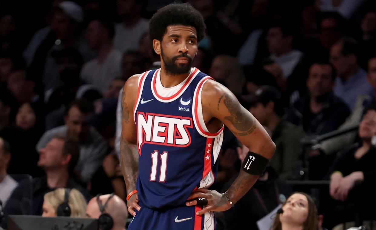 Apr 25, 2022; Brooklyn, New York, USA; Brooklyn Nets guard Kyrie Irving (11) reacts during the second quarter of game four of the first round of the 2022 NBA playoffs against the Boston Celtics at Barclays Center. Mandatory Credit: Brad Penner-USA TODAY Sports