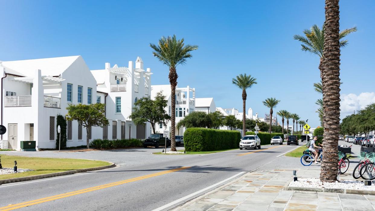 a planned community with beautiful white houses along 30a