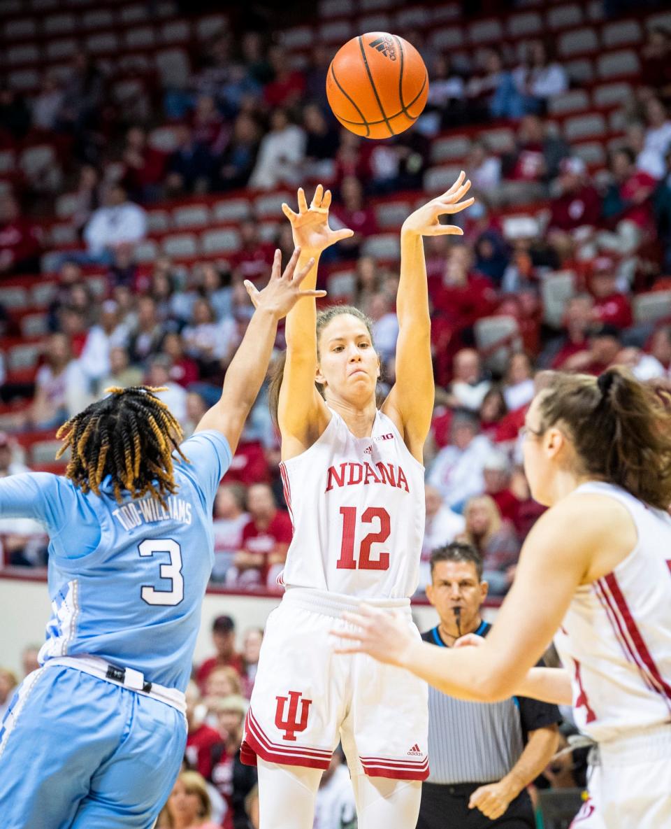 Indiana's Yarden Garzon (12) looks to pass to Mackenzie Holmes (54) during the first half of the Indiana versus North Carolina women's basektball game at Simon Skjodt Assembly Hall on Thursday, Dec. 1, 2022.