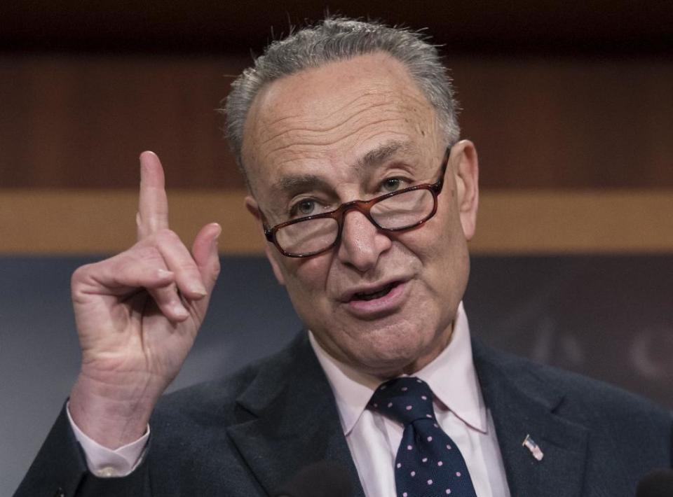 Senate Minority Leader Charles Schumer, D-N.Y., accompanied by other Senate Democrats, speaks during a news conference on Capitol Hill in Washington, Tuesday, Jan. 24, 2017, to offer a proposal to spend $1 trillion on transportation and other infrastructure projects over 10 years in an attempt to engage President Donald Trump on an issue where they hope to find common ground. (AP Photo/J. Scott Applewhite)