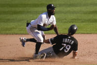 Detroit Tigers shortstop Niko Goodrum tags Chicago White Sox's Jose Abreu (79) out at second base in the ninth inning of a baseball game in Detroit, Monday, Sept. 27, 2021. (AP Photo/Paul Sancya)