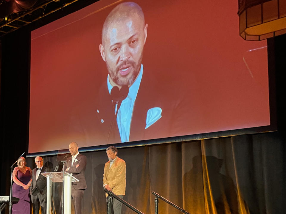 Filmmaker Cord Jefferson and author Percival Everett, accepting the USC Libraries Scripter Award.