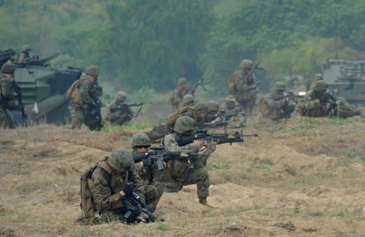 US marines take part in a military drill at a Navy base in Thailand in February 2012. The United States suspended military aid to Thailand after a 2006 coup but reinstated the assistance after elections in December 2007