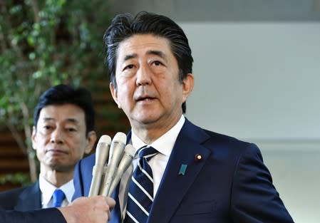 Japan's Prime Minister Shinzo Abe speaks to media at his official residence in Tokyo, Japan