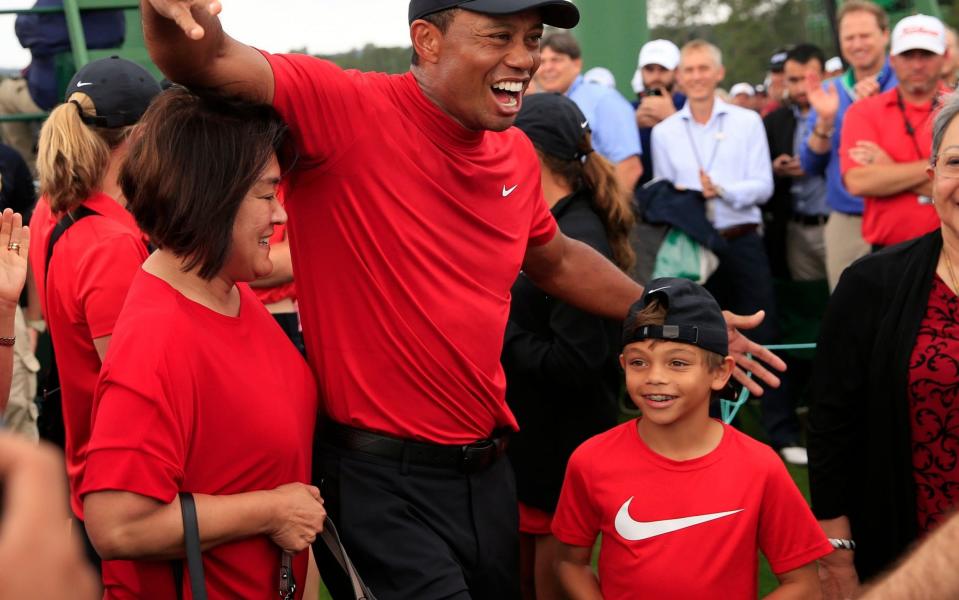 Tiger Woods celebrates with his son Charlie after winning the 2019 Masters - REX