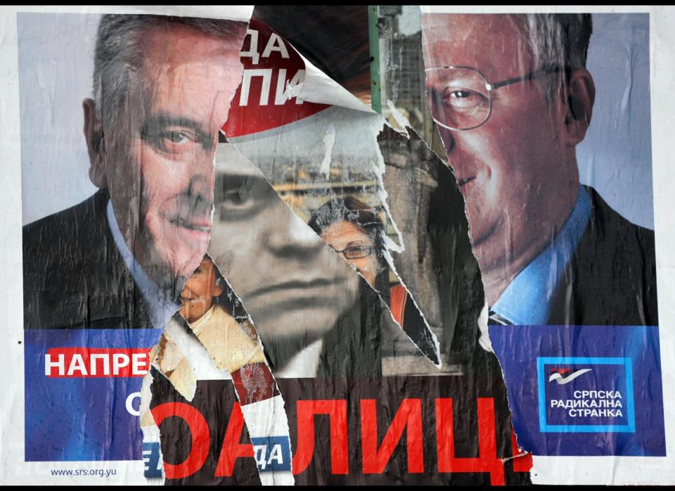 <em>A picture shows ripped pre-election posters of Vojislav Seselj, currently on trial in The Hague for war crimes, leader of the hard-line nationalist Serbian Radical Party, and his deputy Tomislav Nikolic and Serbian Prime Minister Vojislav Kostunica (C) in Belgrade on May 11, 2008. (DIMITAR DILKOFF/AFP/Getty Images) </em><br><br>    The Serb ultranationalist has repeatedly delayed his case. His trial began in November 2006 in his absence because he was on hunger strike. The court then called for a fresh start after allowing Seselj to represent himself. The trial started again in November 2007 but was halted again in February 2009 amid allegations of witness intimidation by Seselj. The trial finally resumed in January 2010 and judges are still considering their verdicts - more than nine years after Seselj surrendered to the court.