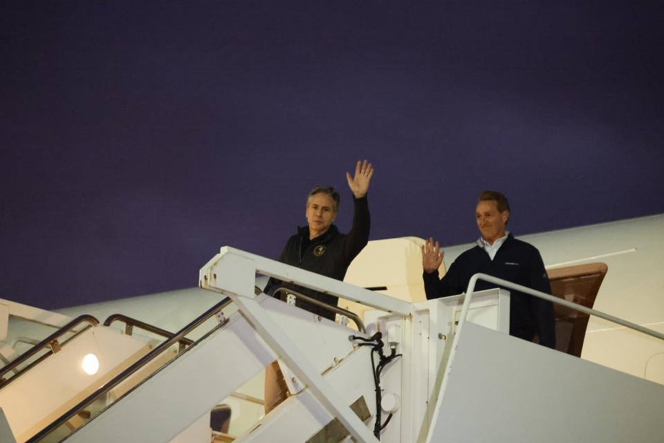 U.S. Secretary of State Antony Blinken waves as he boards a plane at Incirlik Air Base near Adana, Turkey, Sunday, Feb. 19, 2023. (Clodagh Kilcoyne/Pool Photo via AP)