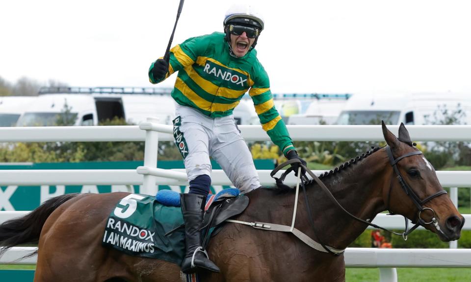 <span>Jockey Paul Townend rides I Am Maximus past the finishing line to win the Grand National.</span><span>Photograph: Tom Jenkins/The Observer</span>