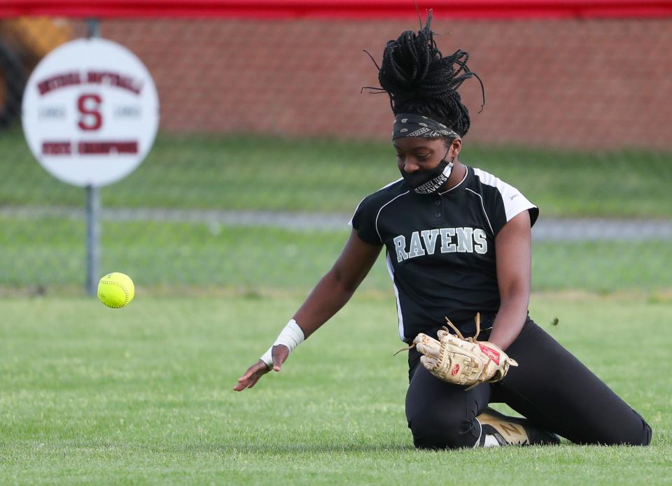 Sussex Tech center fielder Laniya Lewis keeps a line drive in front of her as it bounces in for a hit.