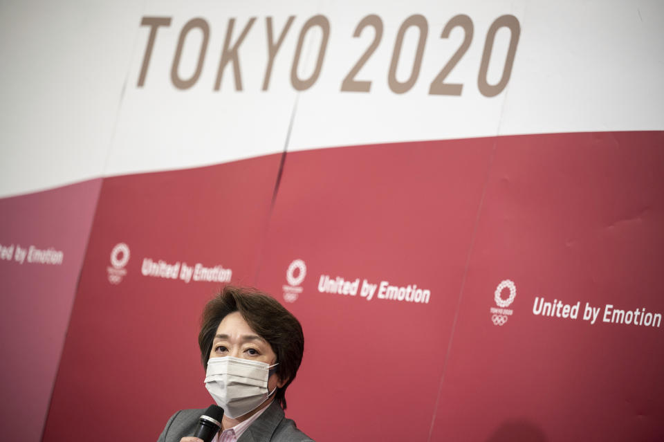 Seiko Hashimoto, president of Tokyo 2020 attends a media huddle following the IOC Executive Board Meeting at the Tokyo 2020 headquarters in Tokyo, Wednesday, April 21, 2021. (Philip Fong/ Pool Photo via AP)