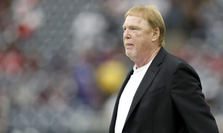 Raiders owner Mark Davis looks on.