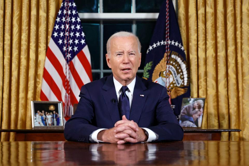 US President Joe Biden addresses the nation on the conflict between Israel and Gaza and the Russian invasion of Ukraine from the Oval Office of the White House in Washington, DC, on October 19, 2023. President Joe Biden will deliver a rare Oval Office speech October 19, 2023 urging Americans to back military aid for Israel and Ukraine at what he calls a perilous moment for democracy around the globe.