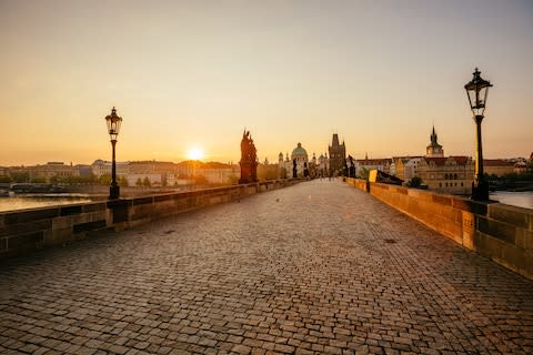 Well done, you arrived in Prague as the sun rises, but now you're exhausted - Credit: Getty