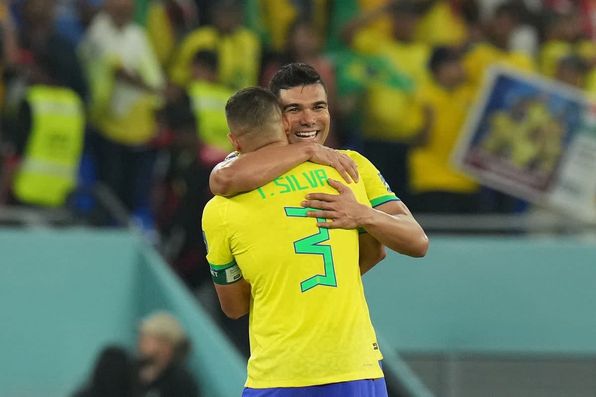 Brazil’s Casemiro and Thiago Silva celebrate after their side’s 1-0 win over Switzerland (Jonathan Brady/PA) (PA Wire)