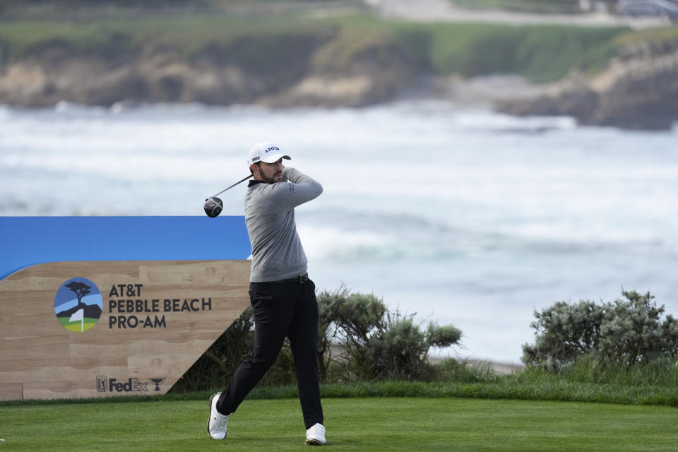 Patrick Cantlay hits from the fourth tee on the Spyglass Hill Golf Course during the first round of the AT&T Pebble Beach National Pro-Am golf tournament Thursday, Feb. 1, 2024, in Pebble Beach, Calif. (AP Photo/Eric Risberg)