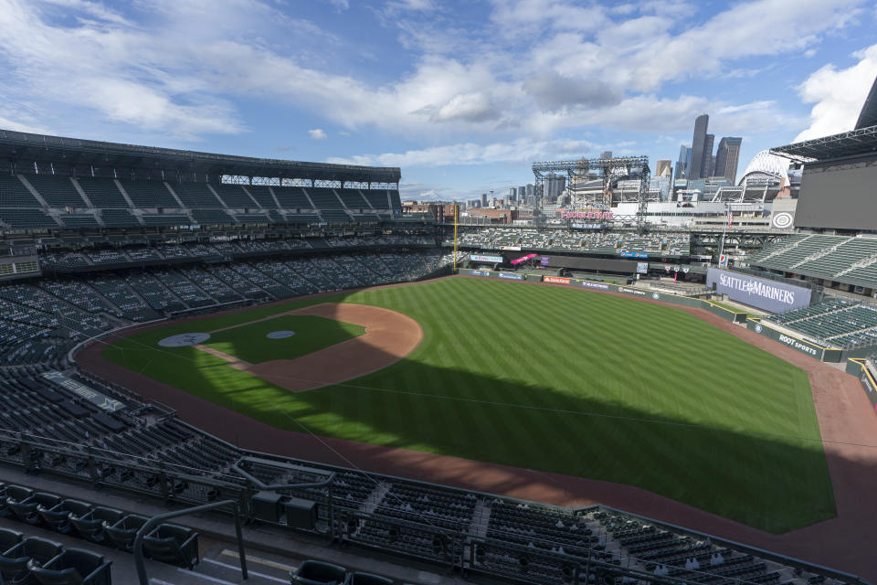 T-Mobile Park, home of the Seattle Mariners baseball team, is shown under clear skies, Wednesday, Oct. 14, 2020, in Seattle, in contrast to several weeks earlier when the area was choked with smoke. Wildfires churning out dense plumes of smoke as they scorch huge swaths of the U.S. West Coast have exposed millions of people to hazardous pollution levels, causing emergency room visits to spike and potentially thousands of deaths among the elderly and infirm, according to an Associated Press analysis of pollution data and interviews with physicians, health authorities and researchers. (AP Photo/Ted S. Warren)