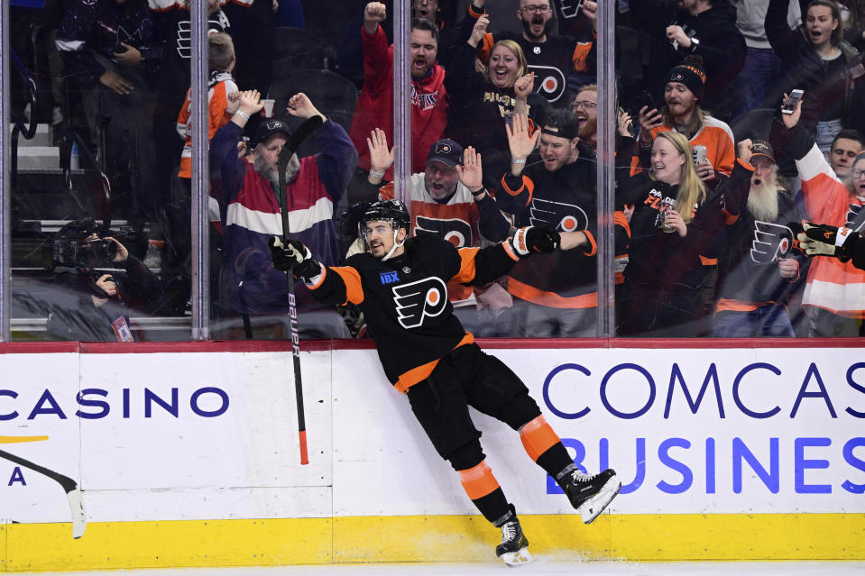 Philadelphia Flyers' Travis Konecny celebrates after scoring during the second period of an NHL hockey game against the Arizona Coyotes, Monday, Feb. 12, 2024, in Philadelphia. (AP Photo/Derik Hamilton)