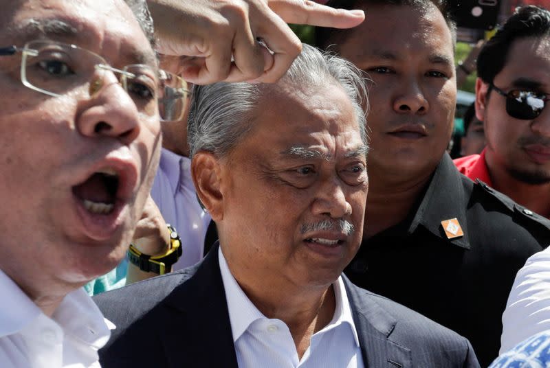 Former Malaysia Prime Minister Muhyiddin Yassin arrives to give a statement to the Malaysian Anti-Corruption Commission (MACC) in Putrajaya