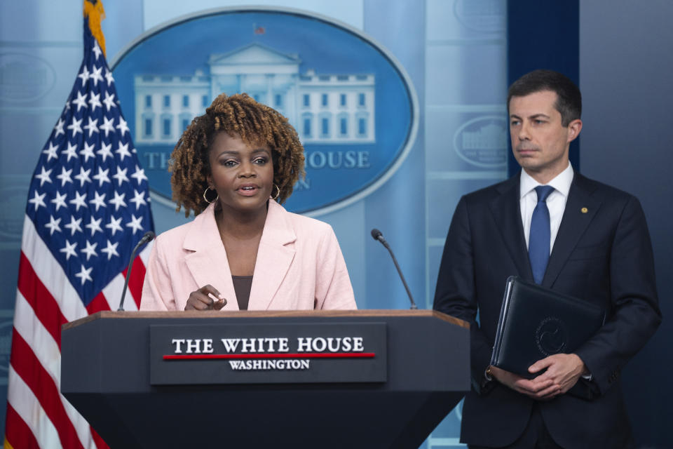 Transportation Secretary Pete Buttigieg listens as White House press secretary Karine Jean-Pierre speaks about the Francis Scott Key Bridge collapse during a press briefing at the White House, Wednesday, March 27, 2024, in Washington. (AP Photo/Evan Vucci)